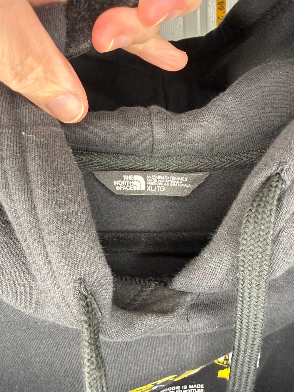 The North Face Black Hoodie with Yellow Map Accent